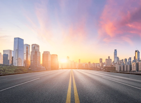 modern cityscape and road at dusk